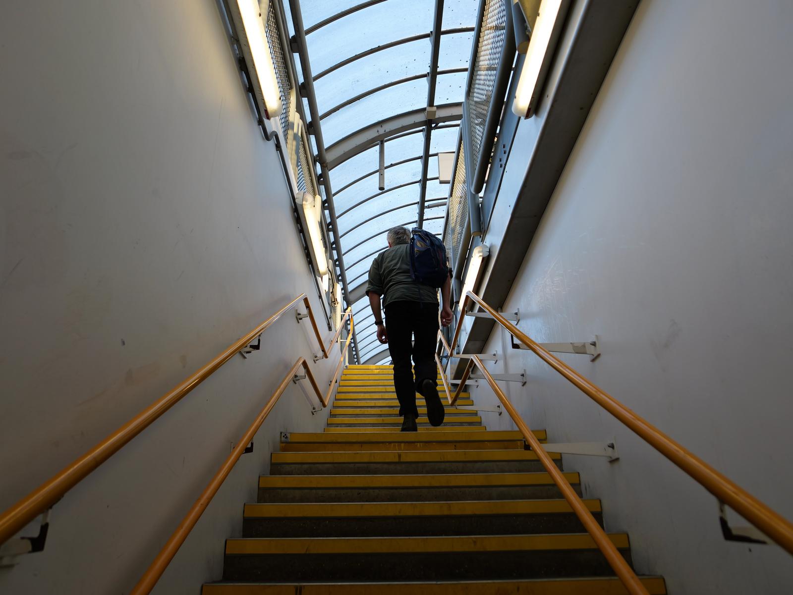 Walking up the stairs at Shadwell DLR station