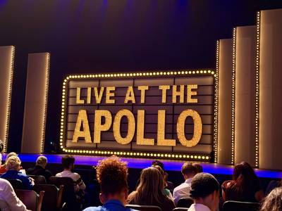“Live at the Apollo” sign on the stage before the show started